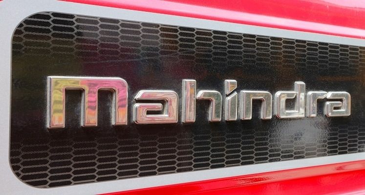 Mahindra logo on a tractor.