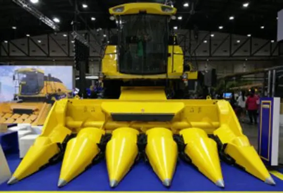 The TC5.30 combine and T6050 tractor are the newest additions to New Holland’s product offering for Thai customers. (Image source: CNH Industrial)