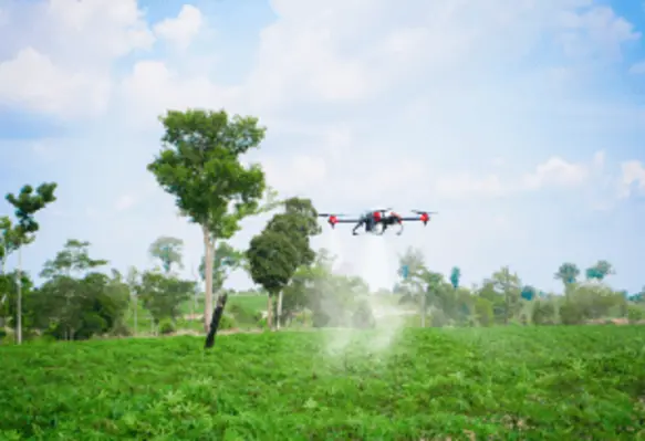 XAG Agricultural Drone conducting aerial spraying to boost cassava productivity. (Image source: XAG)